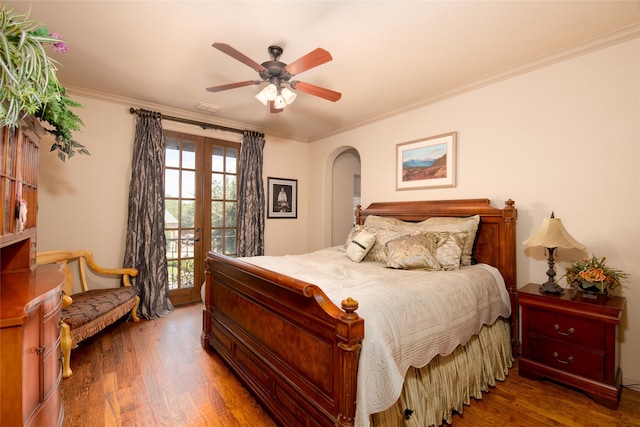 bedroom featuring access to outside, french doors, dark hardwood / wood-style floors, ceiling fan, and ornamental molding