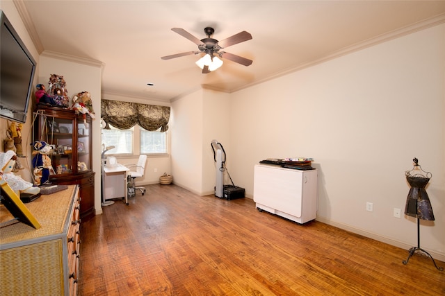 miscellaneous room featuring ceiling fan, wood-type flooring, and ornamental molding