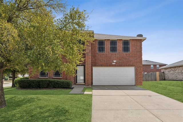 view of front of property featuring a garage and a front lawn