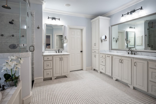 bathroom featuring crown molding, a shower with shower door, and vanity