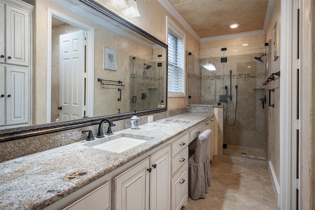 bathroom with crown molding, vanity, an enclosed shower, and tile patterned floors