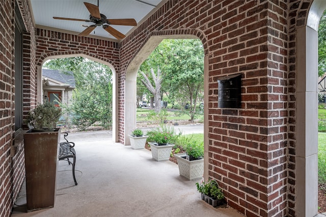 view of patio featuring ceiling fan