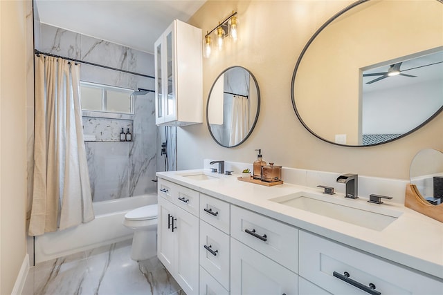 bathroom with toilet, marble finish floor, a sink, and shower / bath combo with shower curtain