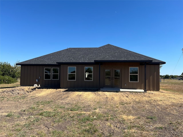 back of property featuring french doors