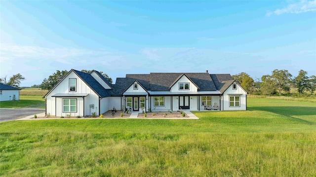 6770 Fm 1372nd Rd, North Zulch, TX 77872 - modern farmhouse style home featuring covered porch and a front yard