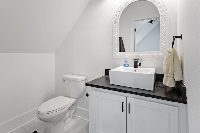 6770 Fm 1372nd Rd, North Zulch, TX 77872 - bathroom with toilet, marble finish floor, vanity, and baseboards