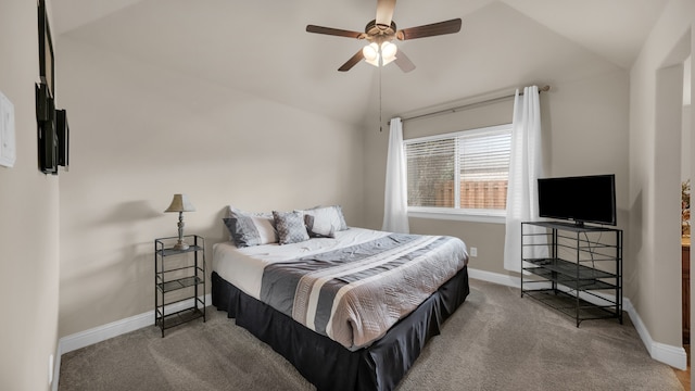 carpeted bedroom featuring vaulted ceiling and ceiling fan