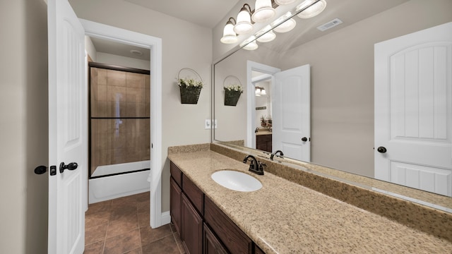 bathroom featuring vanity and shower / bathtub combination