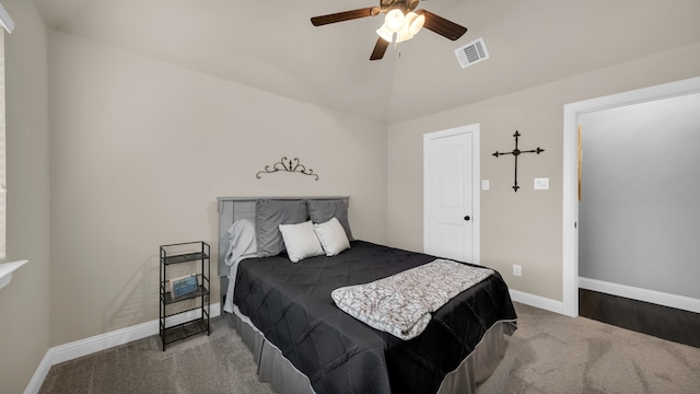 bedroom featuring carpet floors, ceiling fan, and lofted ceiling