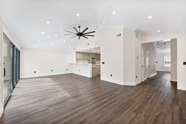 unfurnished living room with ceiling fan, high vaulted ceiling, and dark hardwood / wood-style flooring