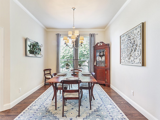 dining area with a notable chandelier, crown molding, and dark wood-type flooring