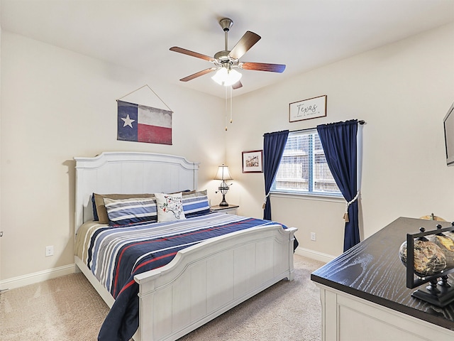 bedroom featuring ceiling fan and light colored carpet