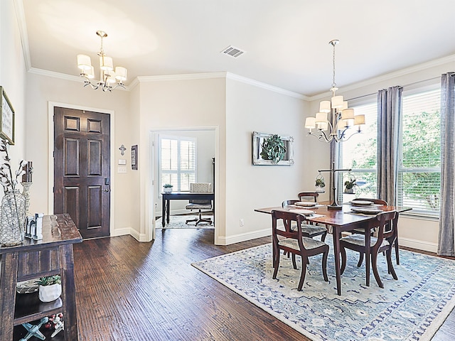 dining space featuring a chandelier, dark hardwood / wood-style flooring, and a healthy amount of sunlight