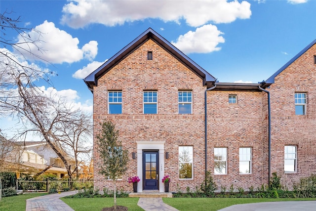 view of front of house with a front lawn