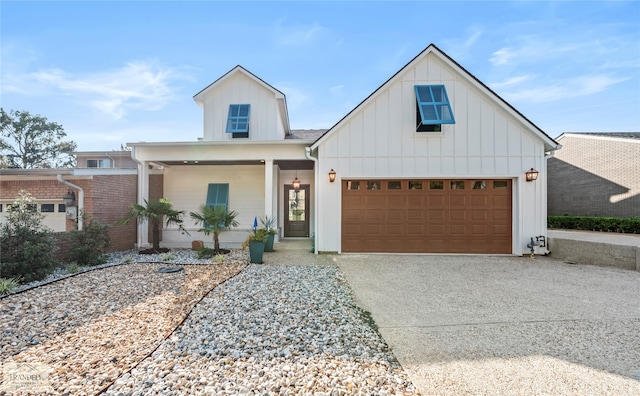 modern farmhouse style home with a garage and covered porch