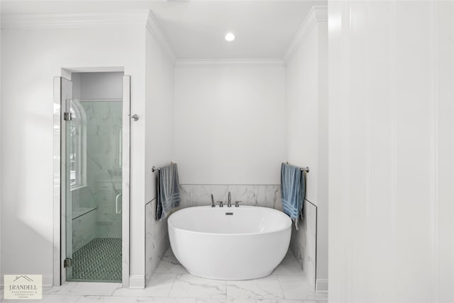 bathroom featuring crown molding and shower with separate bathtub