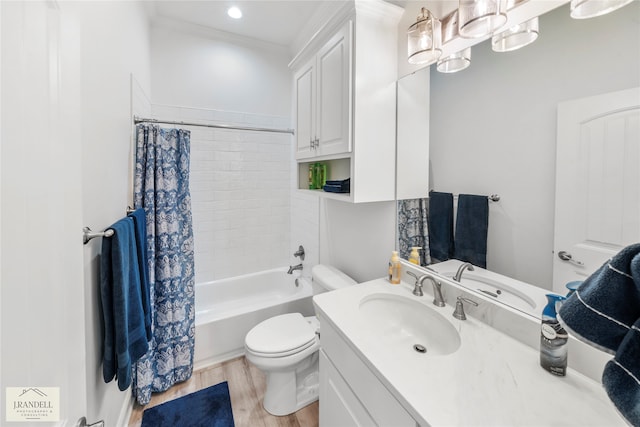 full bathroom with vanity, crown molding, toilet, hardwood / wood-style flooring, and shower / bath combo