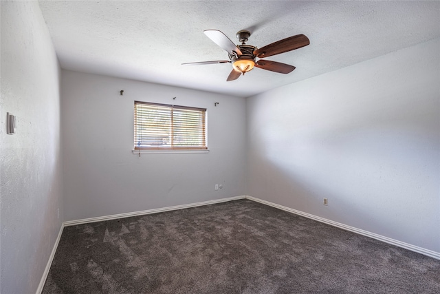 carpeted empty room with a textured ceiling and ceiling fan