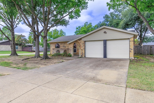 single story home with a garage