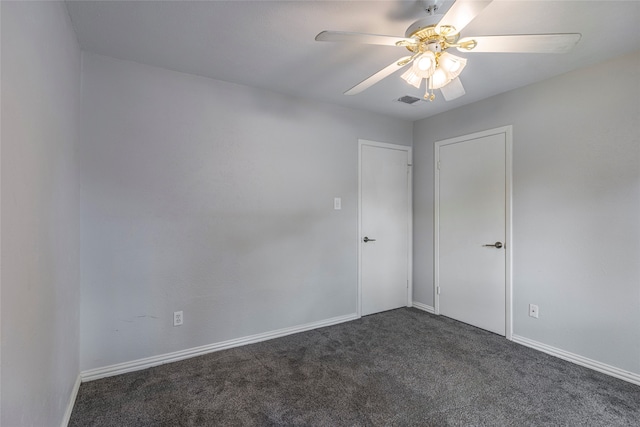 carpeted empty room with ceiling fan