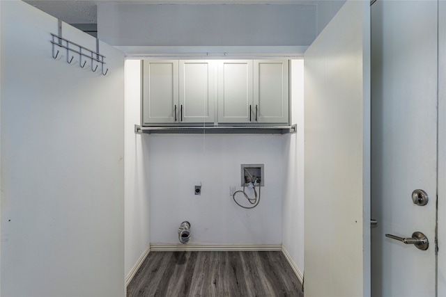 laundry room with washer hookup, cabinets, hookup for an electric dryer, and dark hardwood / wood-style floors