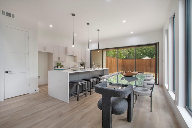 interior space with recessed lighting, visible vents, and light wood-style floors