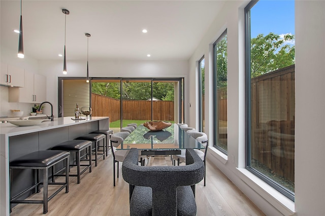 interior space featuring light wood-style flooring and recessed lighting