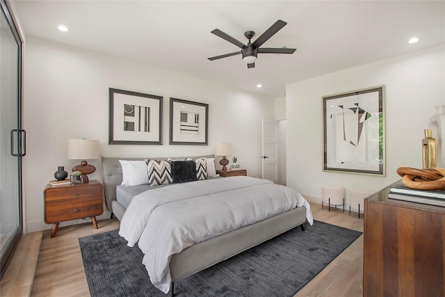 bedroom with baseboards, light wood-style flooring, ceiling fan, and recessed lighting