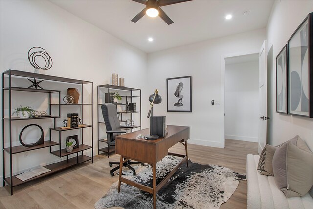 office space with baseboards, wood finished floors, recessed lighting, and a ceiling fan