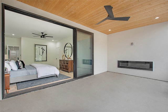 bedroom featuring ceiling fan and wooden ceiling