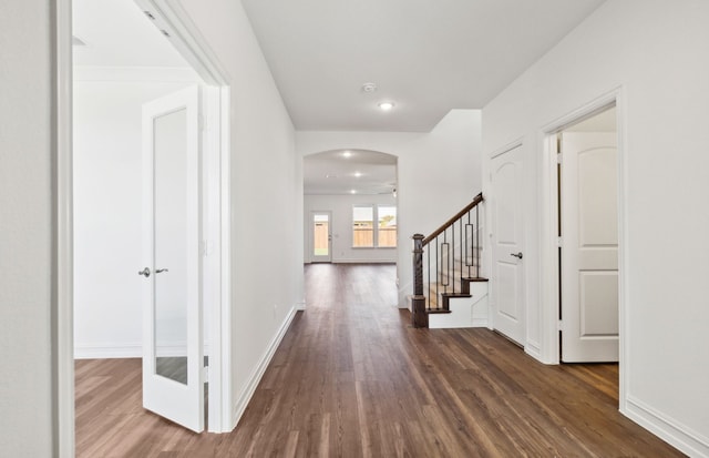 dining space featuring dark wood-type flooring