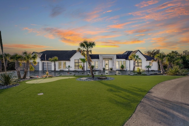 view of front of house featuring a yard