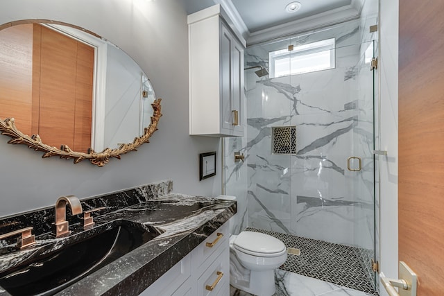 bathroom with toilet, a shower with door, crown molding, and vanity