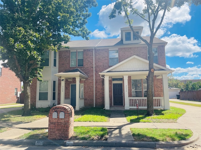 view of front of home featuring covered porch