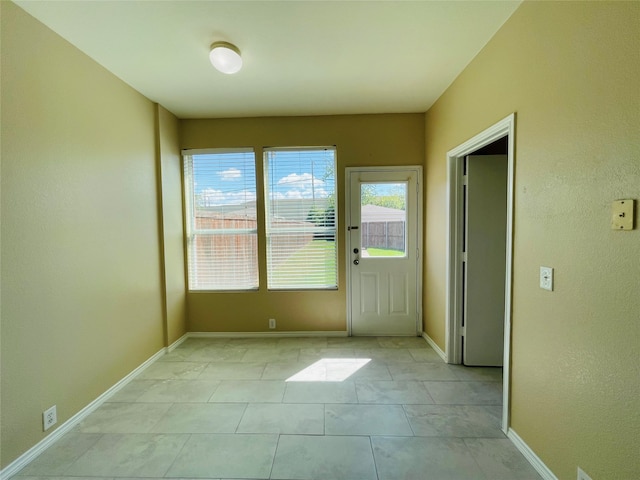 view of tiled empty room