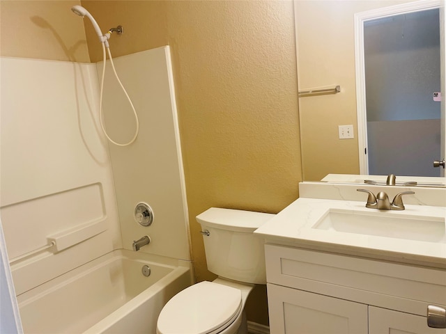 full bathroom featuring washtub / shower combination, toilet, and vanity