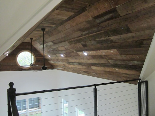 details featuring a ceiling fan, beam ceiling, and wooden ceiling