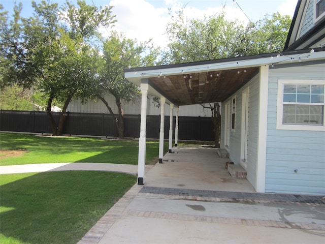 view of patio / terrace featuring a carport