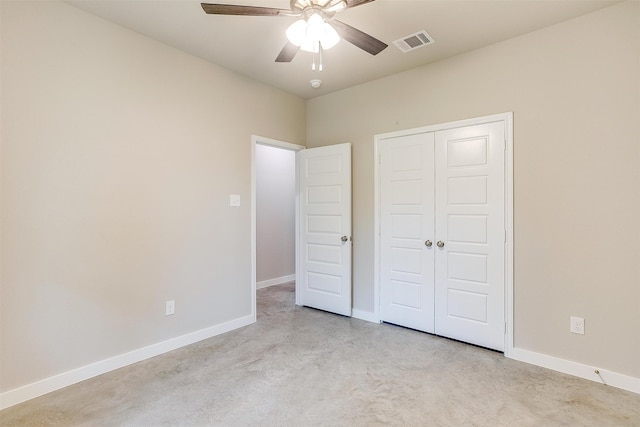 unfurnished bedroom featuring a closet and ceiling fan