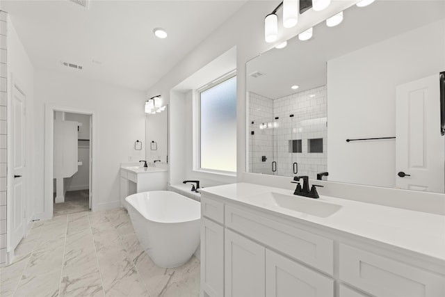 bathroom featuring vanity and plus walk in shower