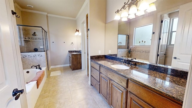 bathroom with ornamental molding, vanity, separate shower and tub, and tile patterned floors