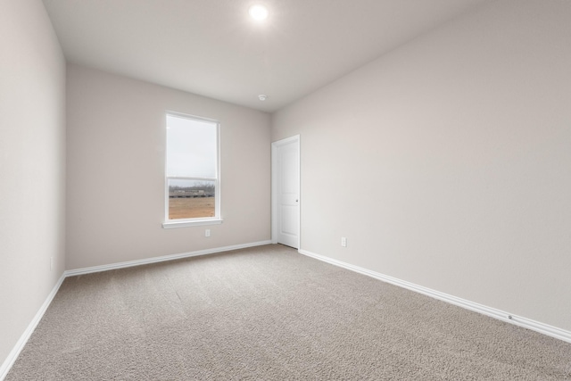 empty room featuring carpet floors