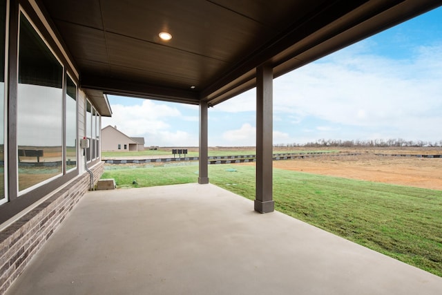 view of patio / terrace with a rural view