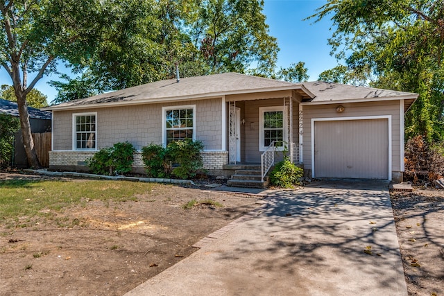 ranch-style home with a garage