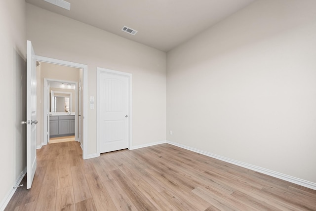 unfurnished bedroom with light hardwood / wood-style flooring