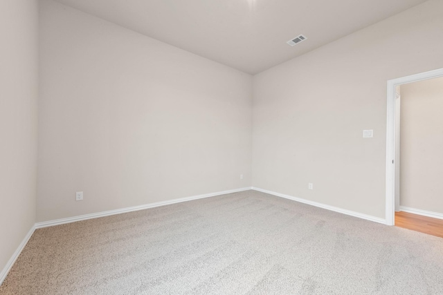 empty room featuring carpet flooring