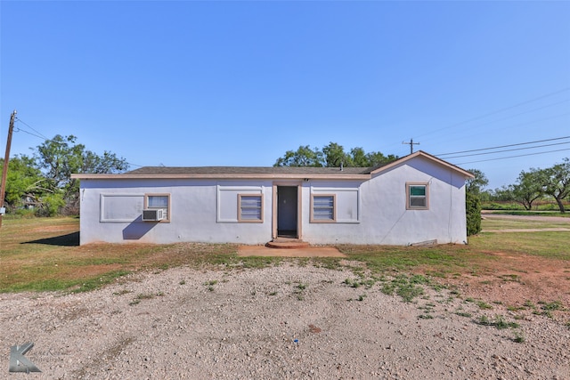 view of front of property featuring cooling unit