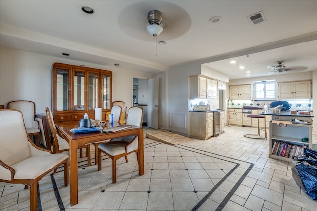 dining room featuring ceiling fan