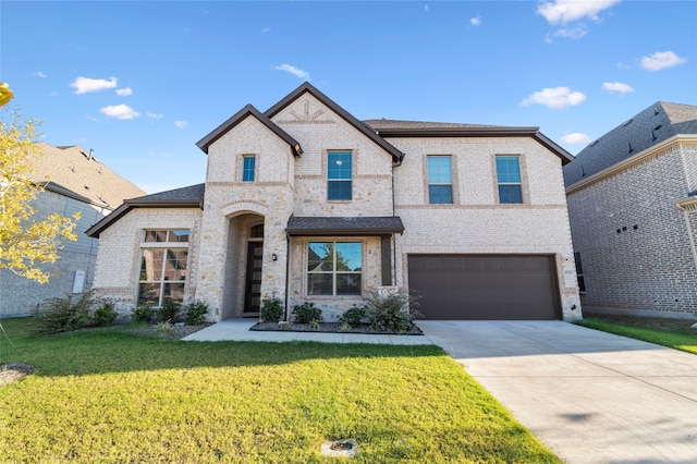 french provincial home featuring a garage and a front lawn