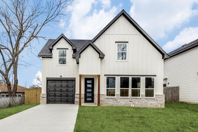 modern farmhouse featuring a garage and a front yard